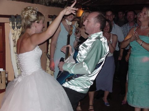 Our guitarist, Jeff, 'gittin' down with the Bride